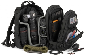 backpack with photography items [camera, detached lens, battery packs, sd cards] packed inside