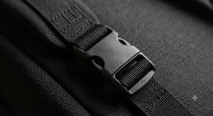black nylon waist pack with close-up view showing the buckle