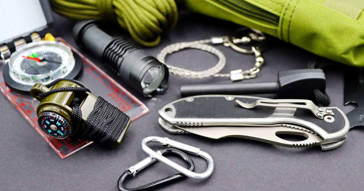 list of essential camping items on table top
