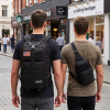 young men walking in urban city with 40 liter tactical backpack