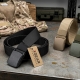 group of nylon utility belts on a steal table with other small outdoor gear
