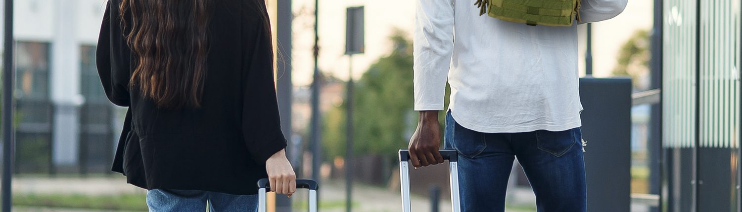 carry-on travel range sling bag on shoulder while walking
