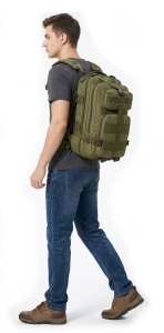 youth wearing a small tactical backpack while walking to school